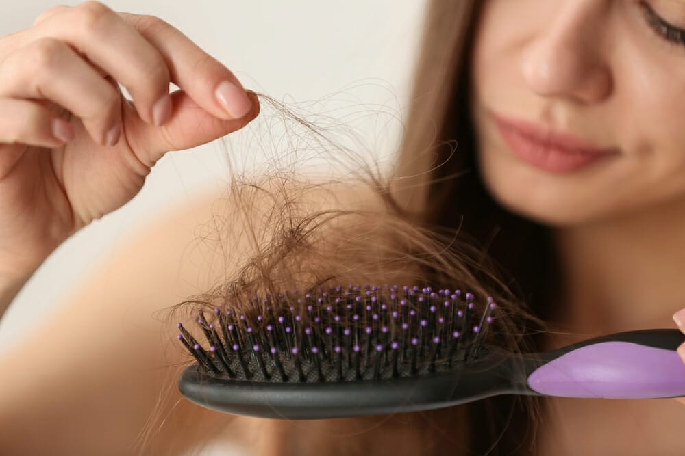  caída del cabello en la mujer